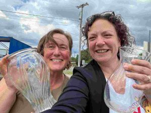 Allison and Martha breaking glass to reduce stress