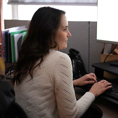 Sydney works on her latest social post for Hastings.