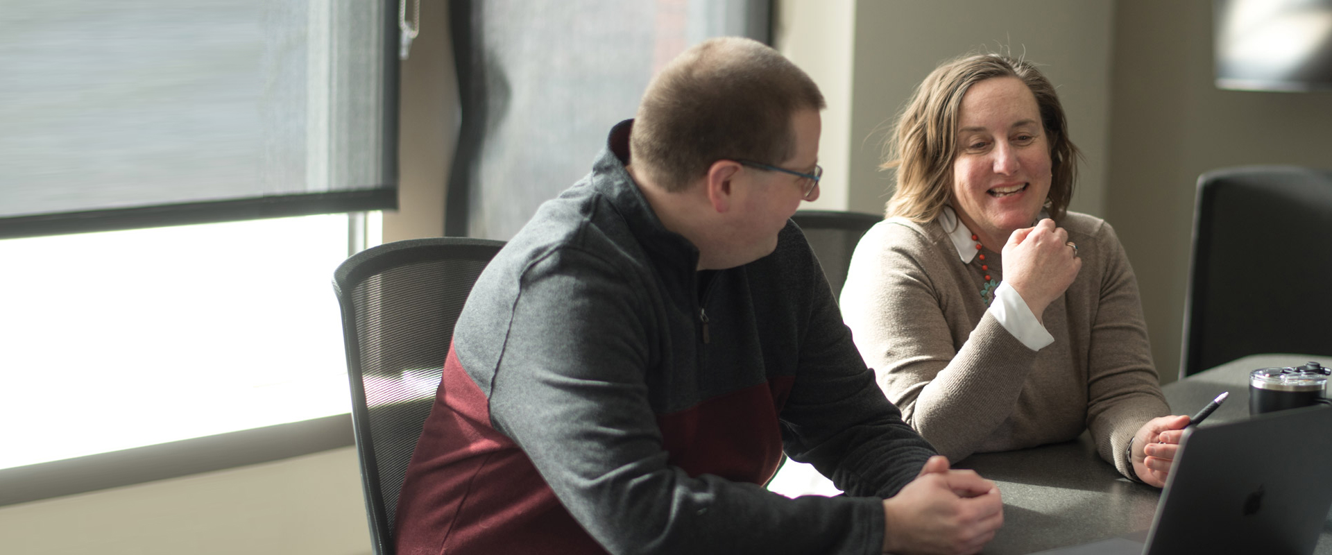 Jeremy and Allison working on web development at LKF Marketing